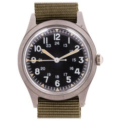 Benrus base metal US Military Issue Post Vietnam Era manual wristwatch, c1974