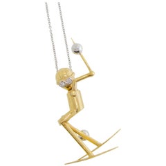 Skier Pendant in Gold with Diamond Accents