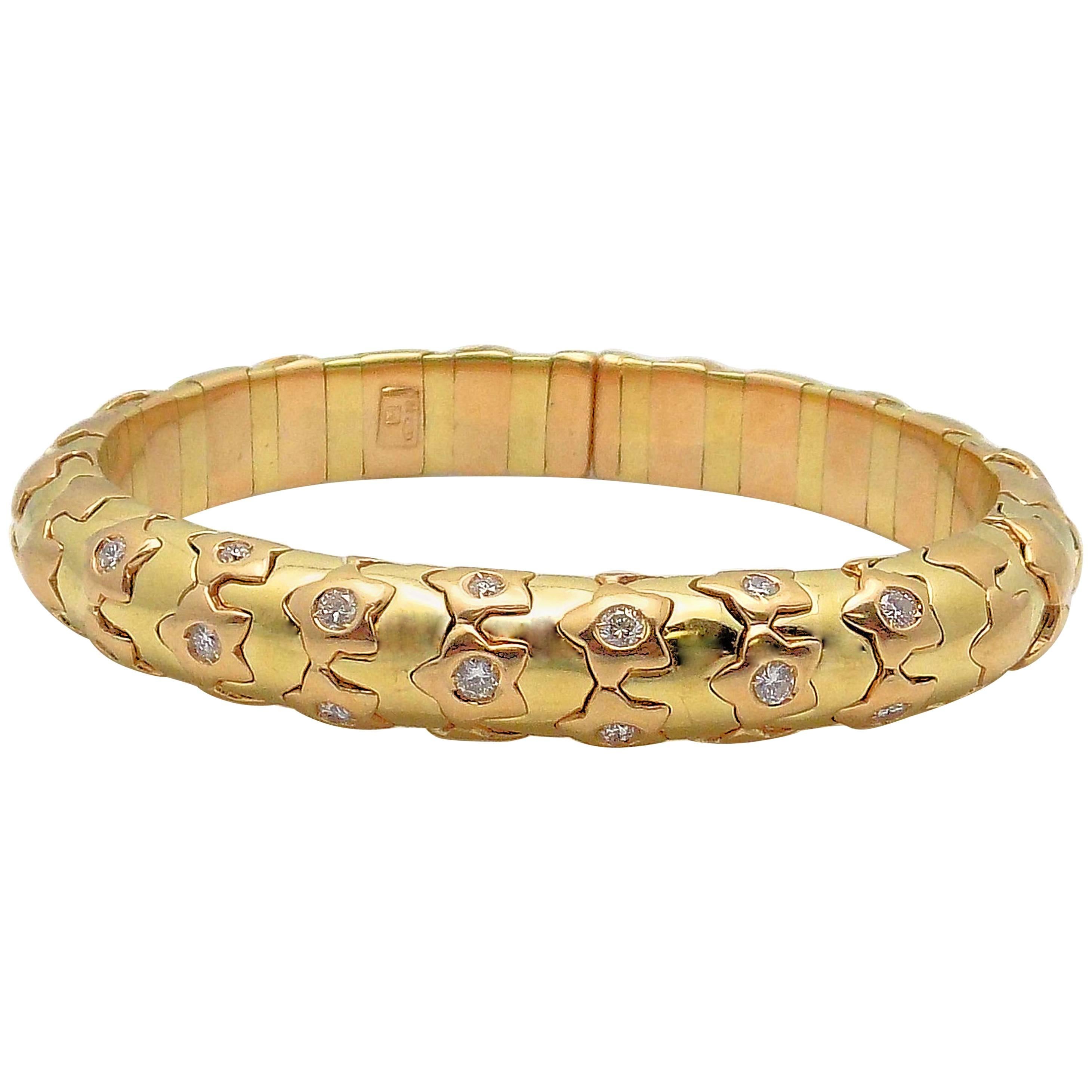 18 Karat Yellow Gold and Diamond Cuff Bracelet, Star Motif For Sale