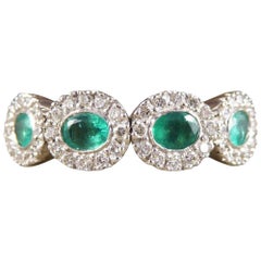 Emerald and Diamond Four-Stone 18 Carat Gold Cluster Ring