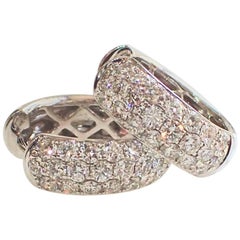 18 Karat White Gold Huggie Earrings are Pavé Set with 0.93 Carat of Set Diamond