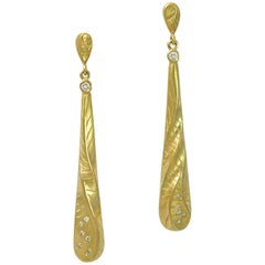 Long Tear Drop Dangle Earrings in 18 Karat Yellow Gold with 0.25 Carat Diamonds