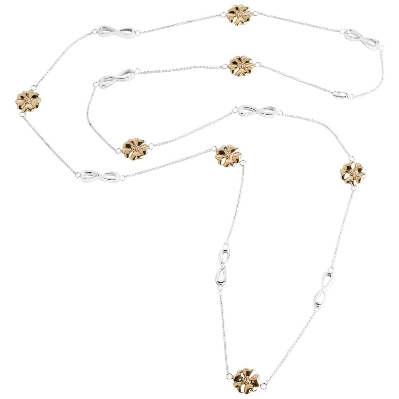 .925 Sterling Silver and 24k Gold Vermeil Blossom and Infinity Lariat Necklace For Sale