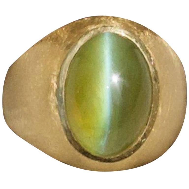 Chrysoberyl Catseye in 18 Karat Yellow Gold Substantial Ring For Sale