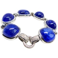 Bracelet in White Gold with 6 Tanzanite Cabouchons and Diamonds.