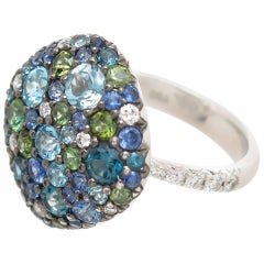 Sapphire, Blue Topaz, Diamond and Green Tourmaline 18 Karat Cluster Ring
