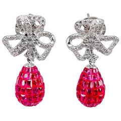 Pendants d'oreilles en or blanc 18 carats avec rubis invisible