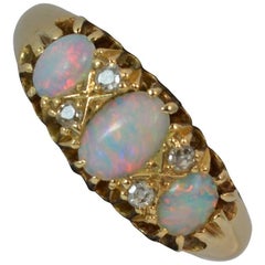 Antique 18 Carat Gold Opal and Old Cut Diamond Cluster Ring