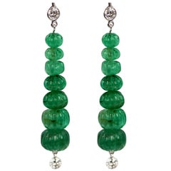 Carved Emerald Beads 18.33 Carat 18 Karat Earrings Diamond Top and Bottom