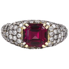 2.92 Carat Emerald Cut Rhodolite Garnet and Round Diamond Ring