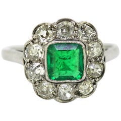 Antique Art Deco Platinum and 18 Carat Gold Ladies Ring with Emerald and Diamonds