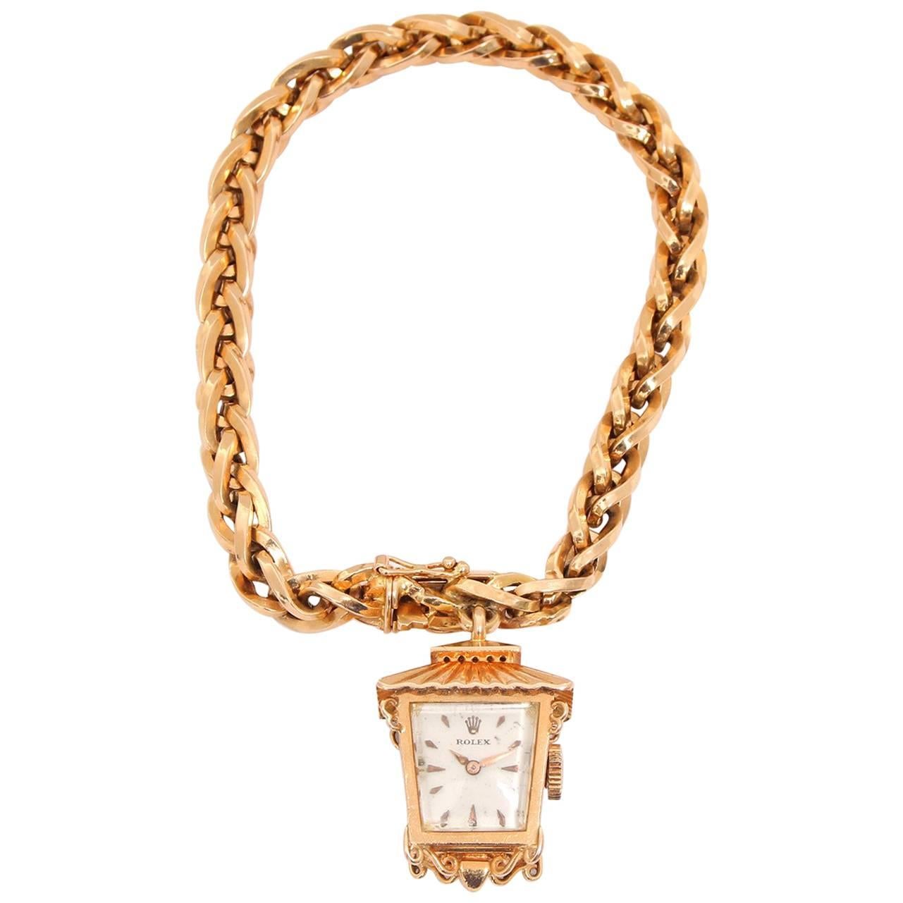 Rolex Ladies Yellow Gold Lantern Charm Bracelet Manual Watch, circa 1960s
