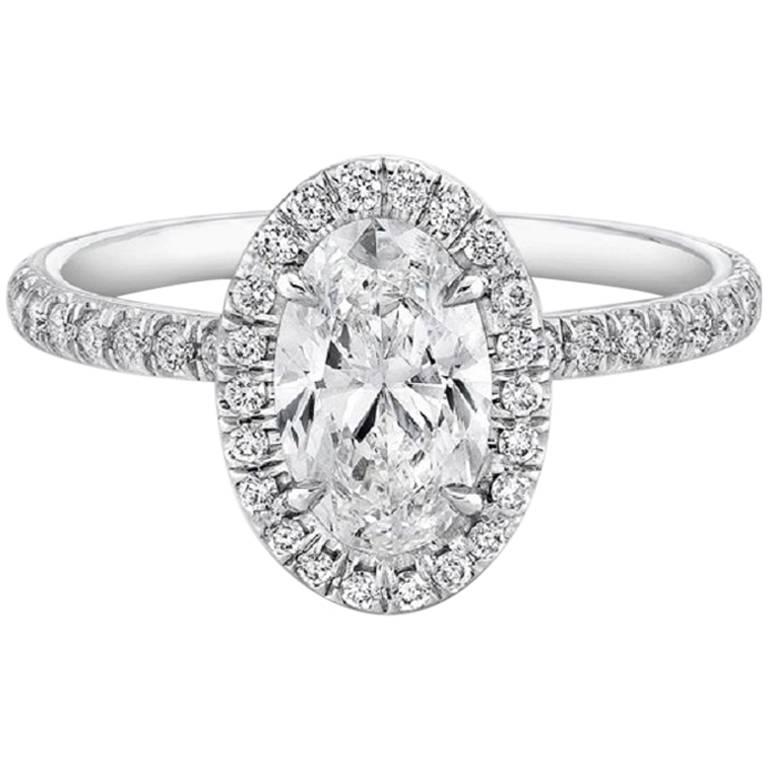 GIA Certified .91 Carat Oval Diamond Engagement Ring For Sale