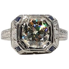 Art Deco 18 Karat 1.40 Carat European Cut Diamond and Sapphire Engagement Ring