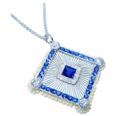 Edwardian Platinum, Sapphire, Diamond and Natural Pearl Pendant
