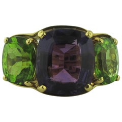 3-Stone Amethyst and Peridot Ring, set in 18 Karat Yellow Gold