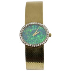 Piaget Ladies yellow gold Diamond Bezel Opal Dial wristwatch