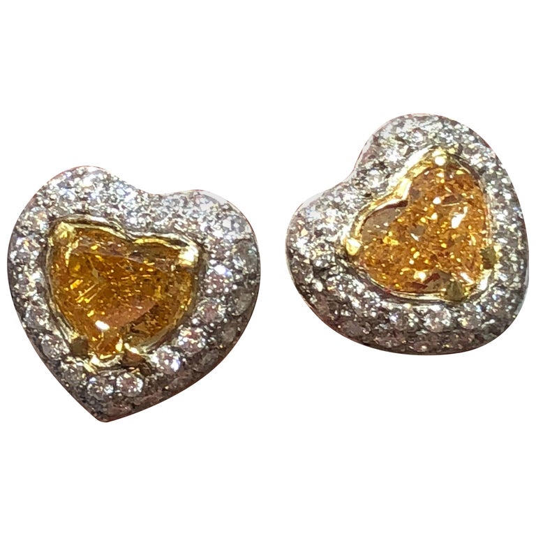 Fancy Intense Yellow Diamond Heart And Round Platinum Stud Fancy Intense Yellow Diamond Heart And Round Platinum Stud Earrings For
