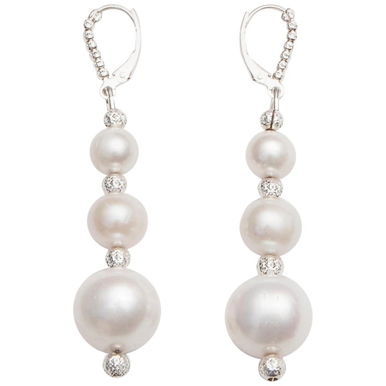 White Pearl Drop Earrings In A Three Tiered Design For At 1stdibs White Pearl Drop Earrings In A Three Tiered Design For