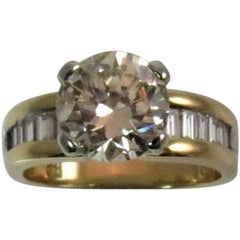 18K Yellow and White Gold Ring Set with 2.11ct Round Diamond and Baguettes