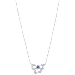 Carelle 18K WG .22 Ct Tanzanite .11 Ct Diamond Florette Pendant 