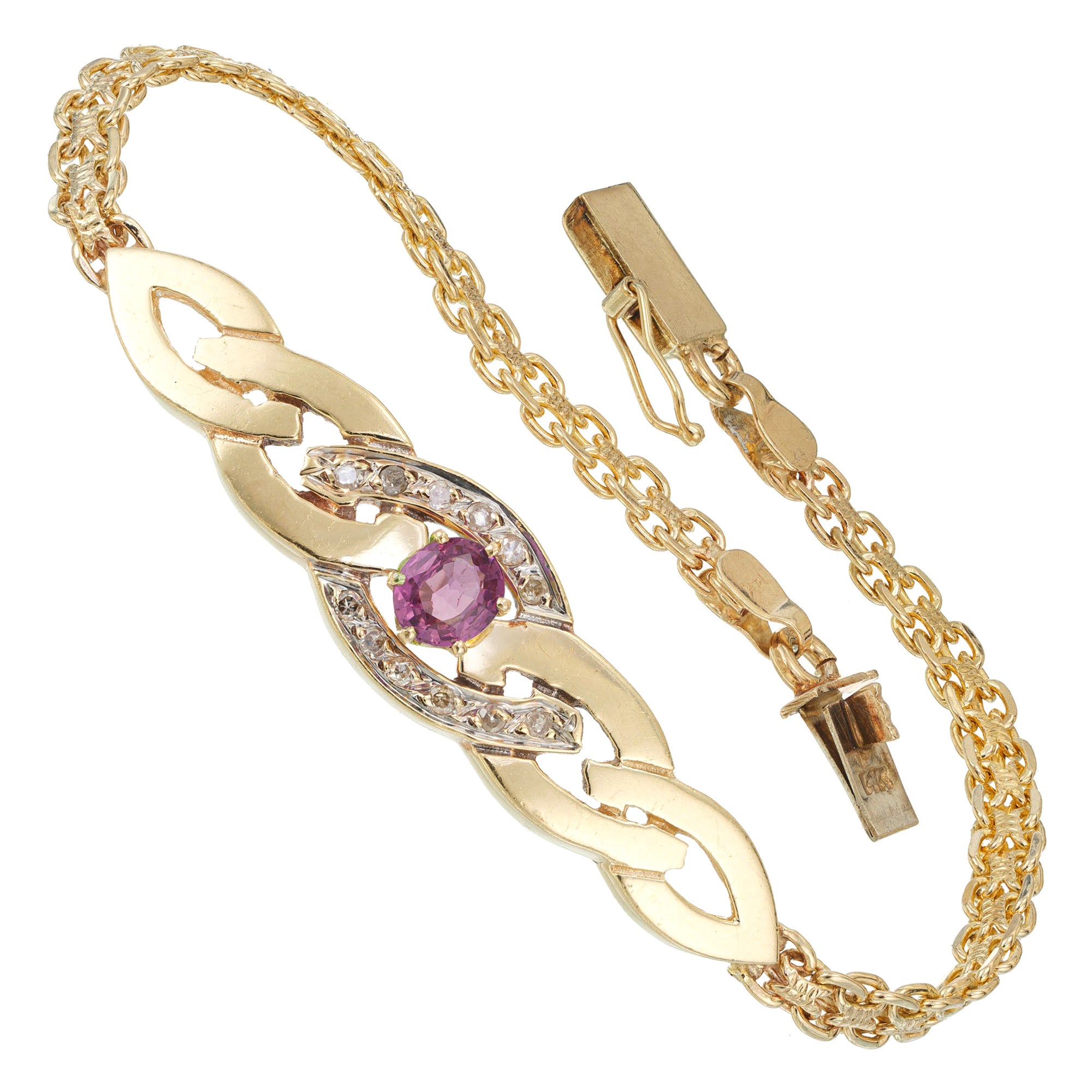 Bracelet caractéristique en or avec tourmaline rose de 0,65 carat et diamant en forme de tourbillon en vente