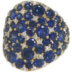 Carelle 18K YG, 6.18 Ct Blue Sapphire, .57 Ct Diamond Tapered Cigar Band Ring