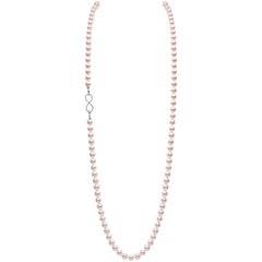 Yoko London Pearl Necklace with Diamond Set Infinity Motif 18 Karat Gold Clasp