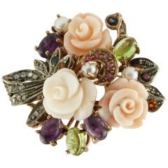 Diamonds Rubies Sapphires Amethyst Peridots Pearls Coral Gold and Silver Ring