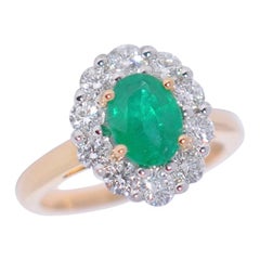 Emerald and White Diamond on White and Yellow Gold 18 Karat Engagement Ring