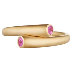 Modern 18 Karat Gold and .23 Carat Pink Sapphire Single Whirl Stacking Band Ring