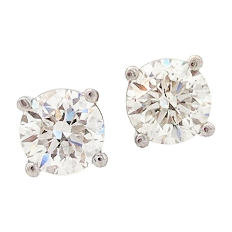 14 Karat White Gold Bezel Set Blue And Diamond Stud Earrings 14 Karat White Gold Diamond Stud Earrings 75 Carat