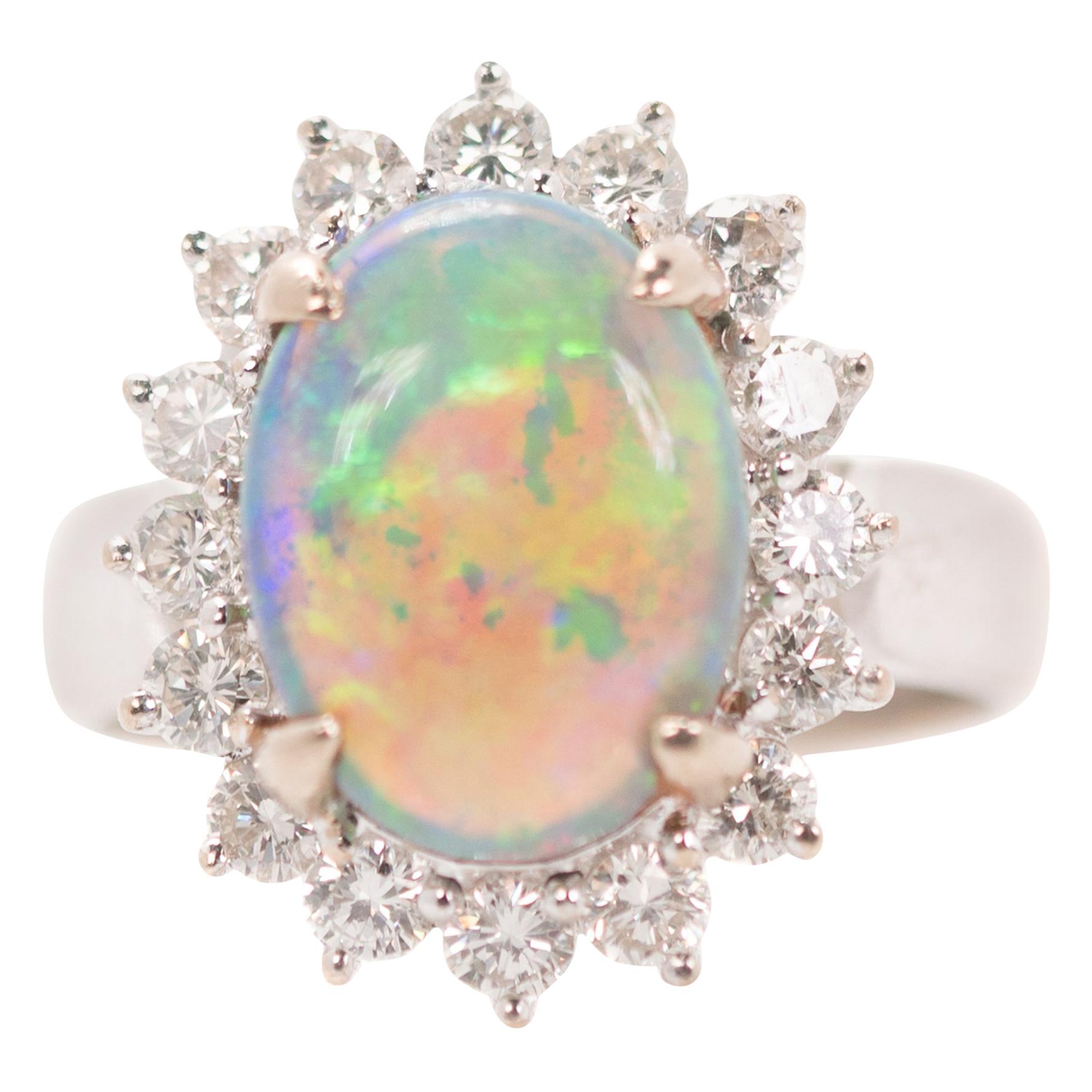 GIA Opal Oval Cabochon and Diamond Halo 18 Karat White Gold Engagement Ring