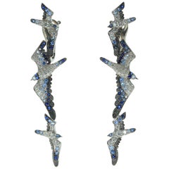 Boucles d'oreilles mouette en or blanc 18 carats avec diamants et saphirs