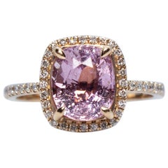 Estate Vintage 14 Karat Rose Gold Oval Pink Sapphire and Diamond Halo Ring