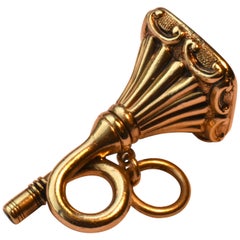 Antiker viktorianischer Uhrenschlüssel und Tropfensiegel aus Gold in Form eines Trompetensiegels