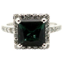 Estate Vintage 18 Karat White Gold Green Tourmaline and Round Diamond Halo Ring