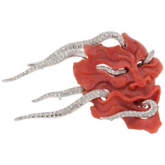 Coral Mask Brooch with White Diamond in White 18 Karat Gold