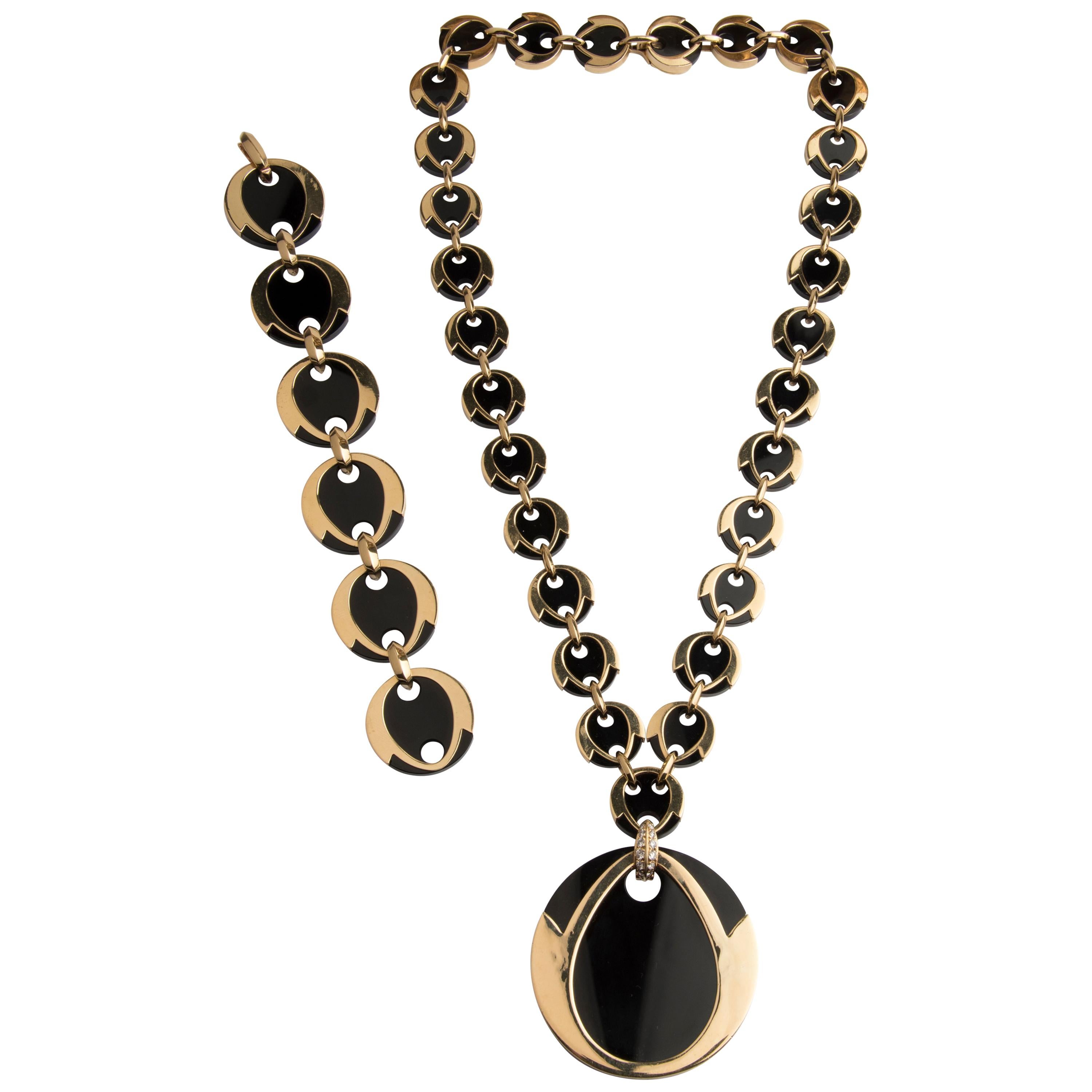 Boucheron 18 Karat Gold Diamond and Onyx Bracelet and Necklace Parure For Sale