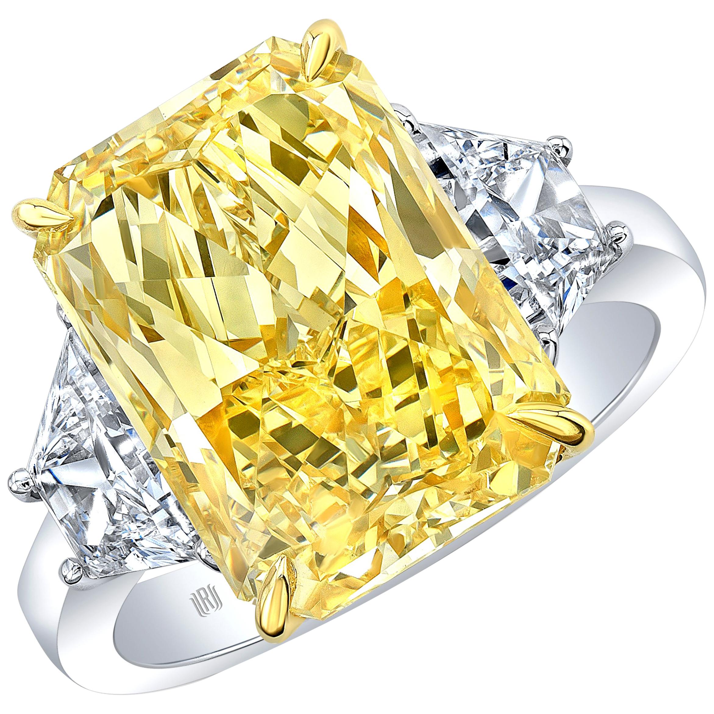 GIA Certified 7.95 Carat Radiant Cut Fancy Yellow Diamond Three-Stone Engagement For Sale