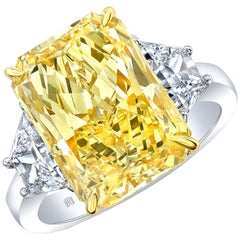 GIA Certified 7.95 Carat Radiant Cut Fancy Yellow Diamond Three-Stone Engagement