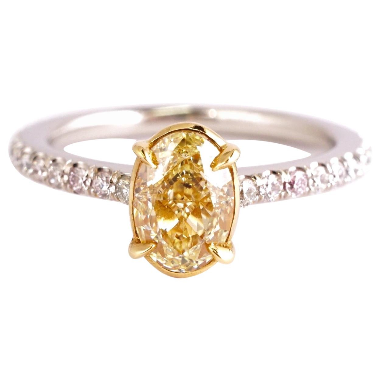 Fancy Yellow 1.12 Carat Oval Cut Diamond Engagement Platinum Ring