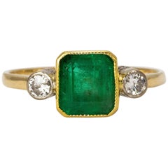 Art Deco Emerald and Diamond 18 Karat Yellow Gold Ring