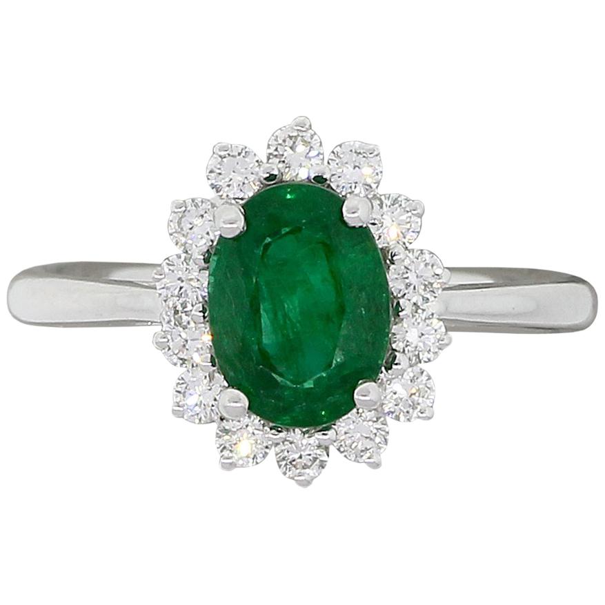 Oval Shape Emerald and Round Brilliant Diamond Halo Ring