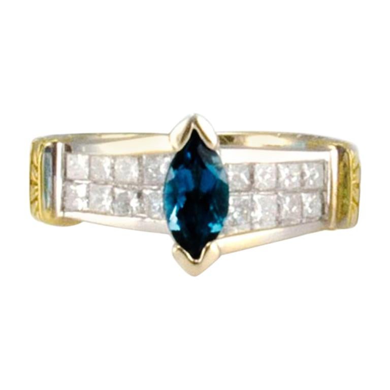 0.60 Carat London Blue Topaz and Invisible Set Princess Cut Diam Cocktail Ring