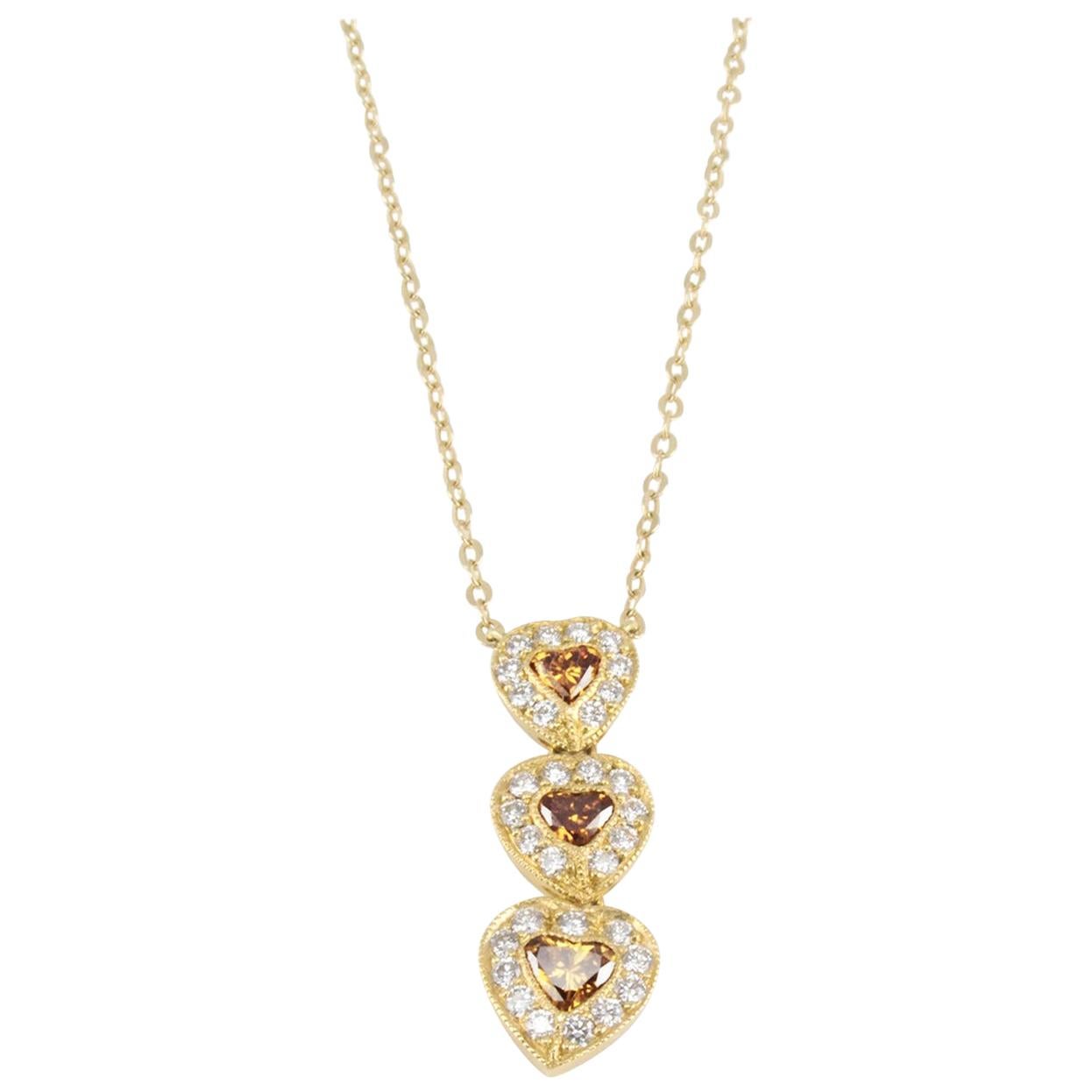 0.39 Carat Total Heart Shape Orange-Brown Diamond 18 Karat Yellow Gold Pendant For Sale