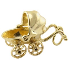 14 Karat Yellow Gold Articulated Baby Carriage Charm
