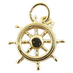 14 Karat Yellow Gold Ship
s Wheel Charm