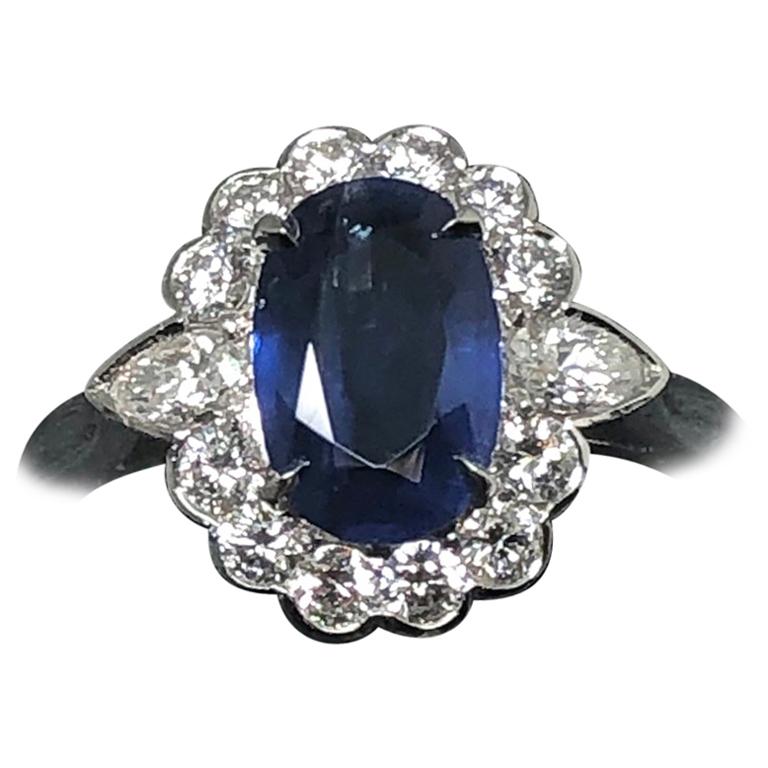 Sapphire 1.85 Carat and Diamond Cluster Ring Mounted in Platinum