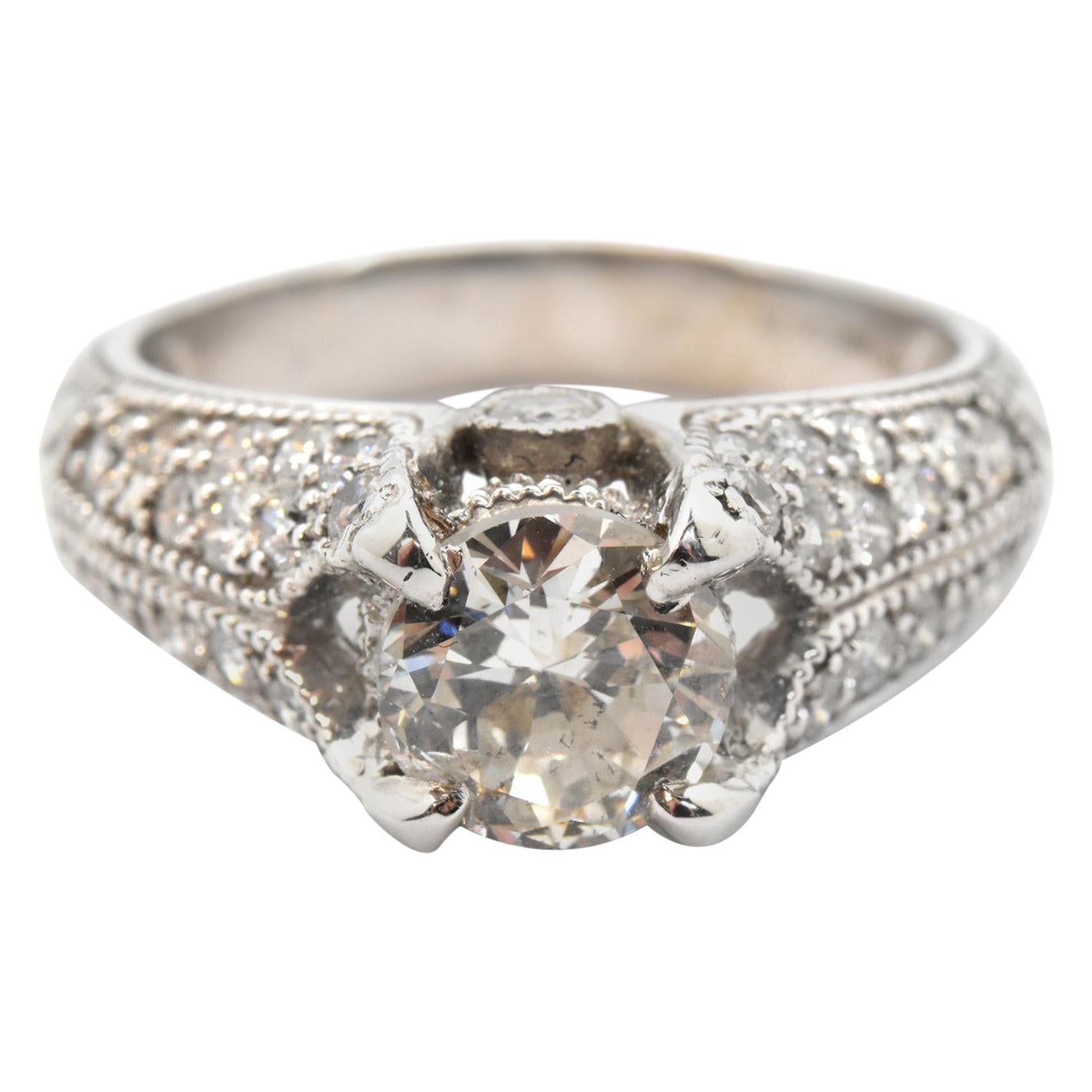 14 Karat White Gold and 1.38 Carat Round Diamond Ring with 0.75 Carat Accents